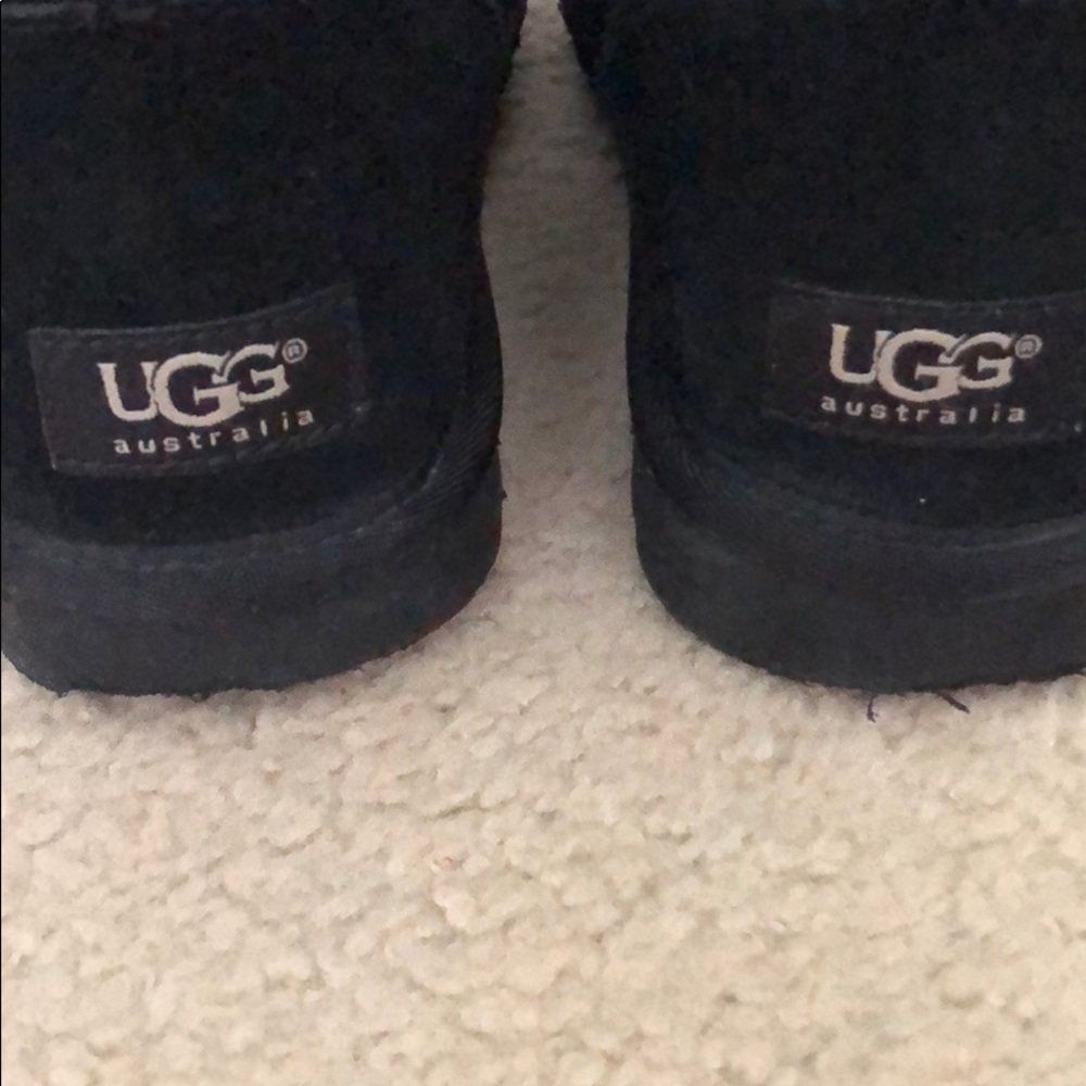 Tall black Ugg boots